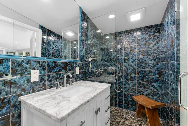 a view of a patio with table and chairs and potted plants