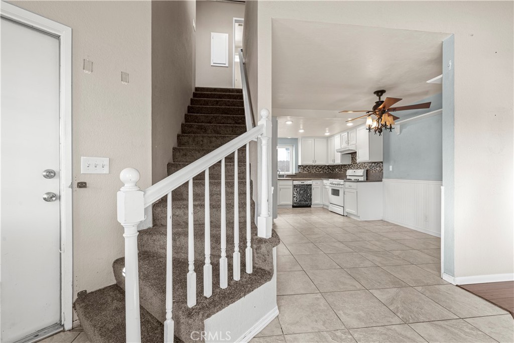 881 South Lamarr Street Rialto, CA 92376 - Photo 17 of 54 a view of a kitchen from the hallway