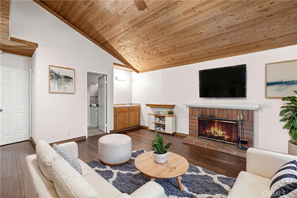 881 South Lamarr Street Rialto, CA 92376 - Photo 27 of 54 a living room with furniture and a fireplace