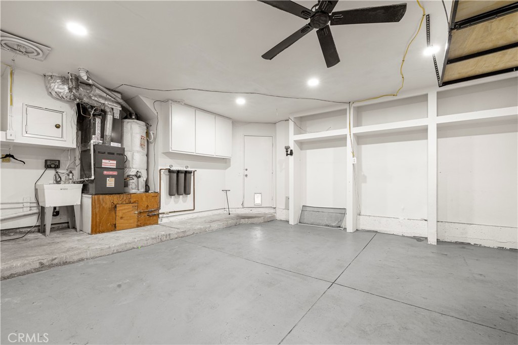 881 South Lamarr Street Rialto, CA 92376 - Photo 45 of 54 a view of a livingroom with furniture and a ceiling fan