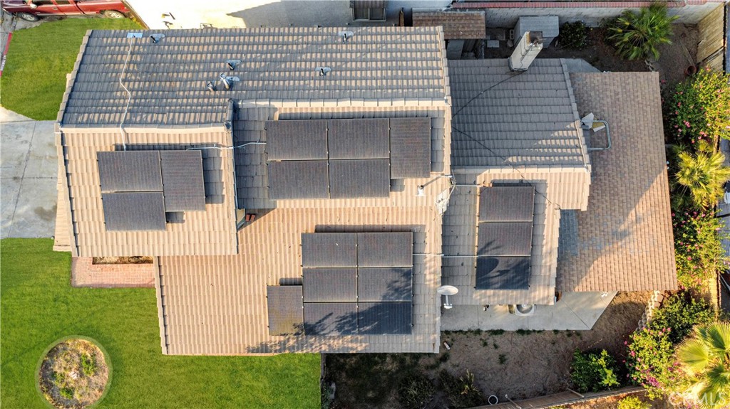 881 South Lamarr Street Rialto, CA 92376 - Photo 46 of 54 a front view of a house with garden