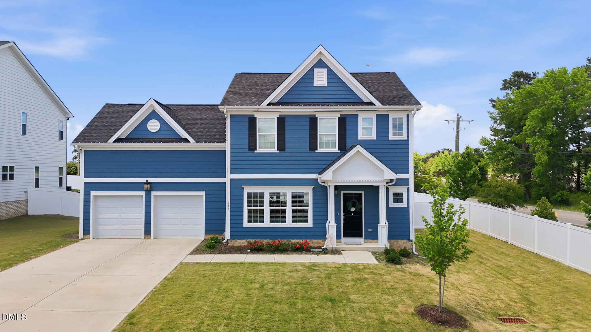 104 Kavanaugh Road Wake Forest, NC 27587 - Photo 1 of 36 a front view of a house with garden