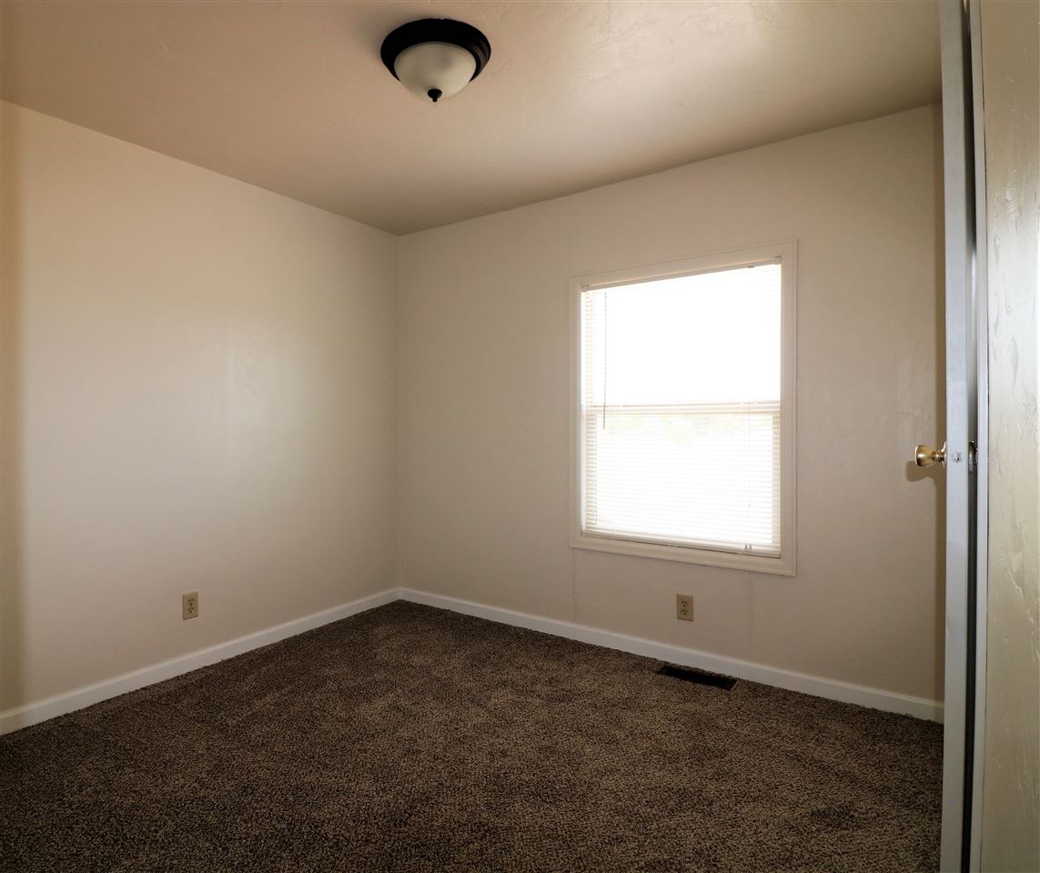 1505 10 Road Mack, CO 81525 - Photo 18 of 27 an empty room with a window