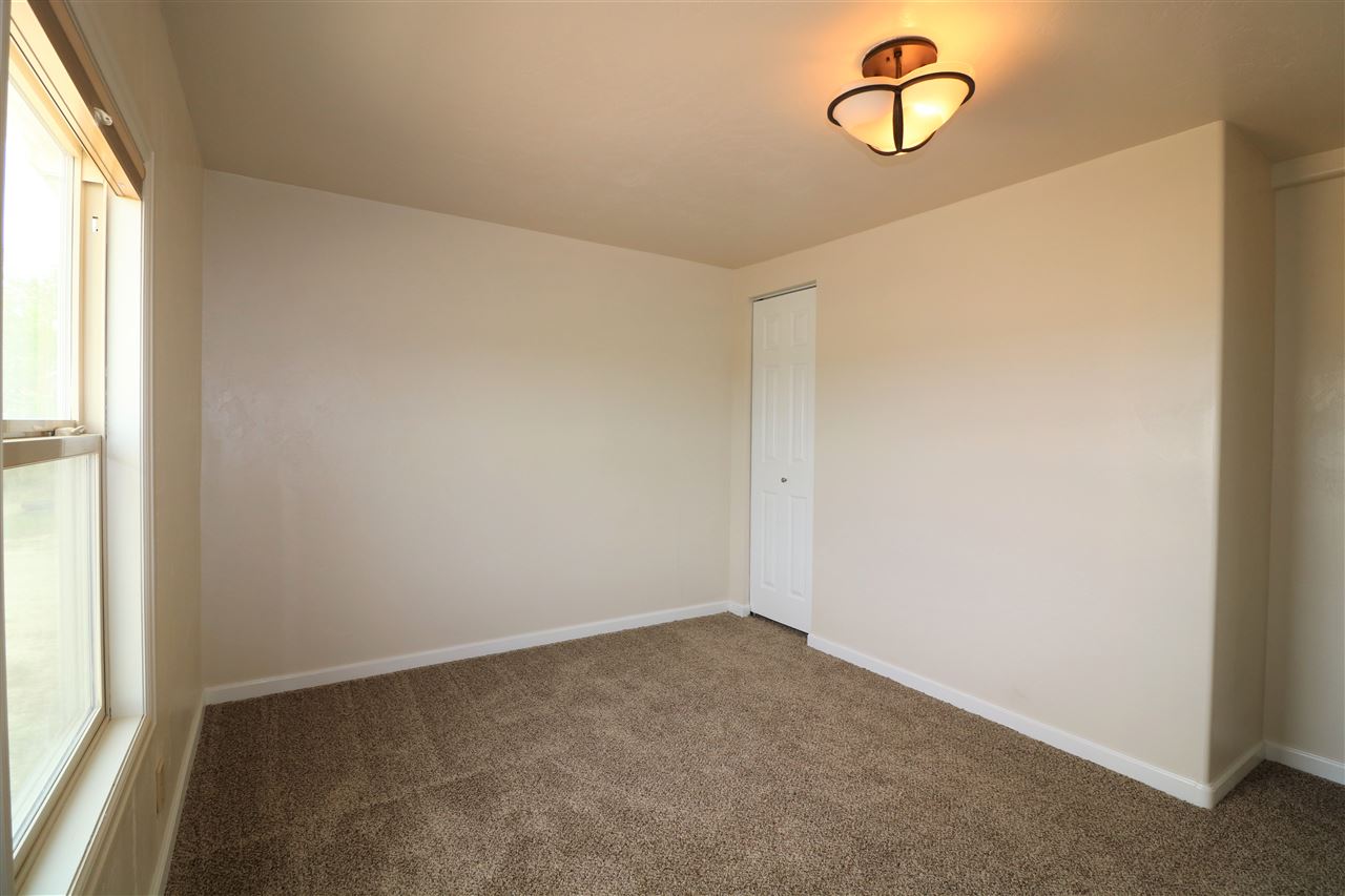 1505 10 Road Mack, CO 81525 - Photo 19 of 27 an empty room with a window