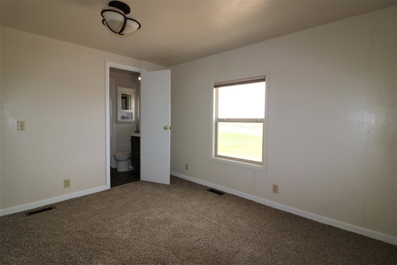 1505 10 Road Mack, CO 81525 - Photo 20 of 27 an empty room with a window