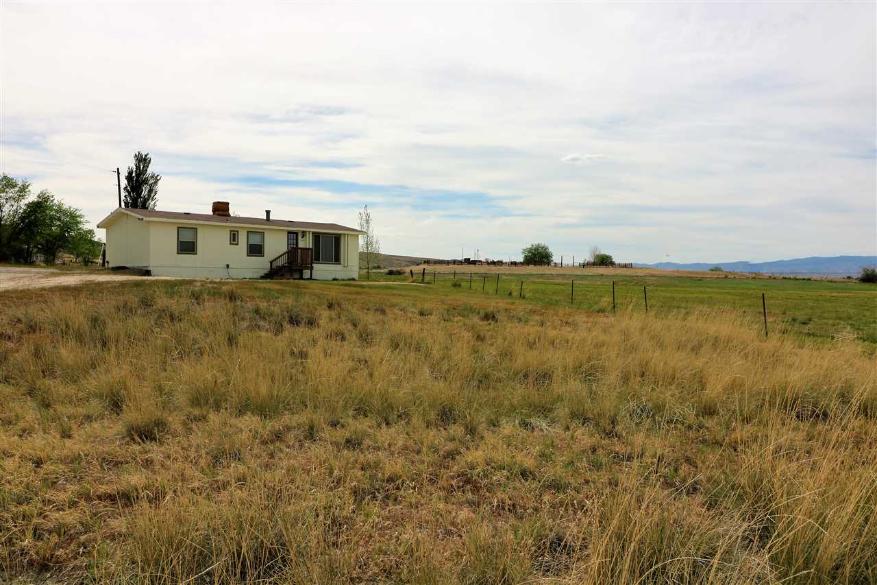 1505 10 Road Mack, CO 81525 - Photo 27 of 27 a view of a lake with houses in big room