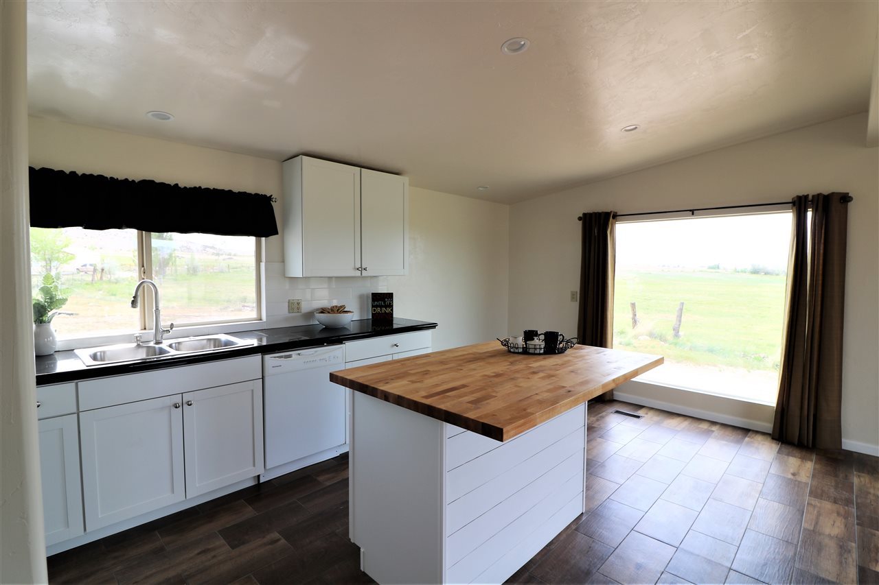 1505 10 Road Mack, CO 81525 - Photo 5 of 27 a kitchen with a sink and a large window