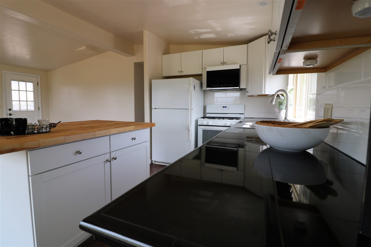 1505 10 Road Mack, CO 81525 - Photo 8 of 27 a kitchen with a sink appliances and cabinets