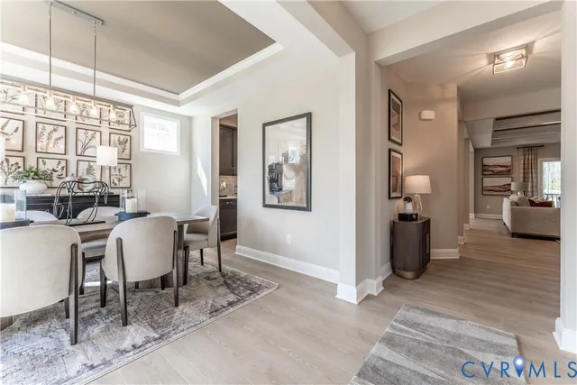 a view of a livingroom with furniture and windows