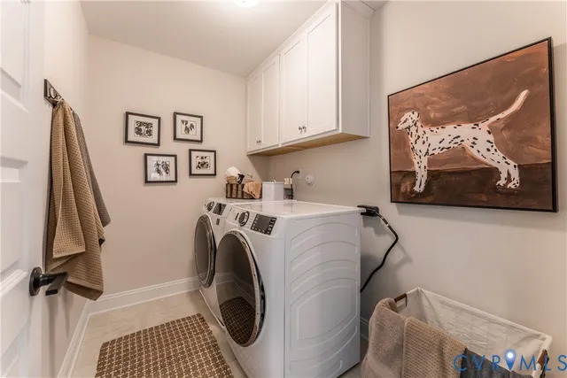 a bedroom with furniture and a large window