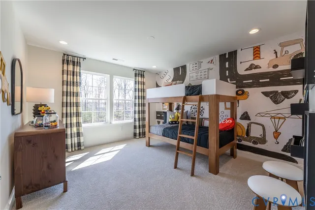 a room with furniture and gym equipment