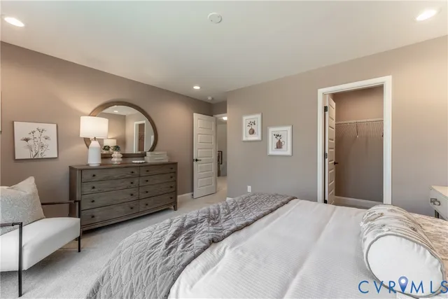 a big house with a big yard and potted plants