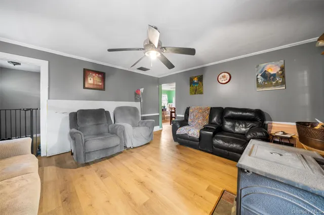a living room with furniture and a couch