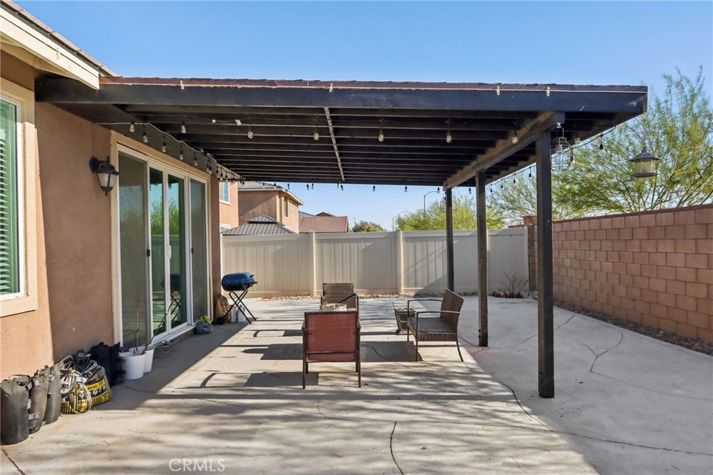 45643 Sancroft Avenue Lancaster, CA 93535 - Photo 16 of 18 a patio view with a patio