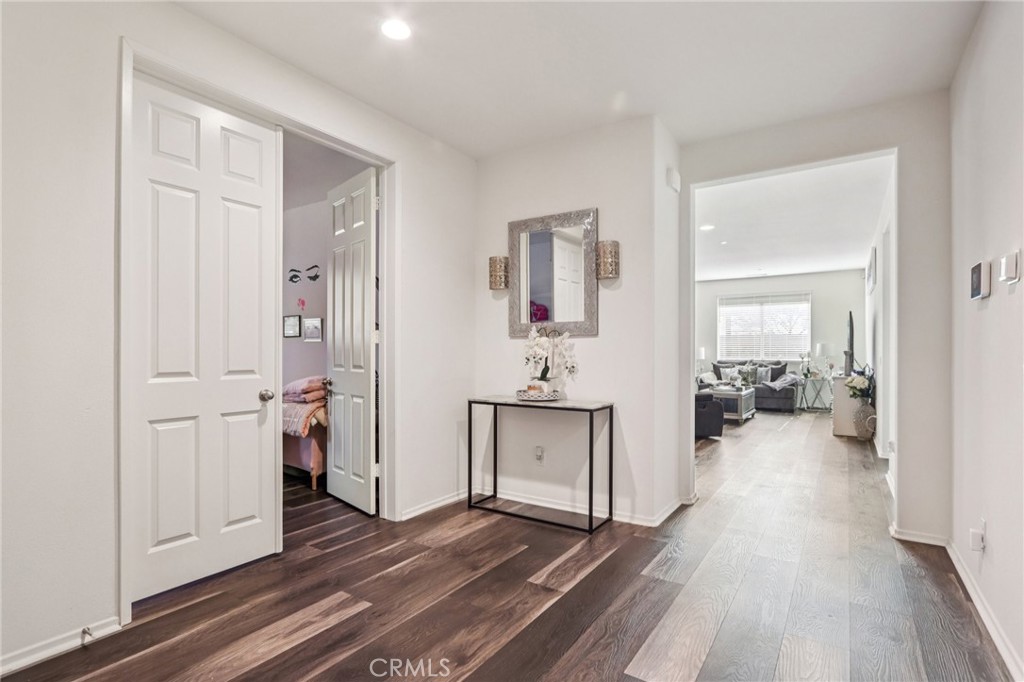 45643 Sancroft Avenue Lancaster, CA 93535 - Photo 2 of 18 a view of a hardwood floor and a sink