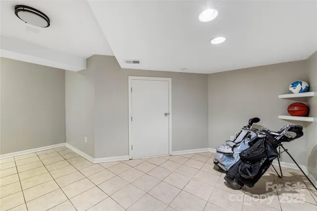 a view of a hallway with windows