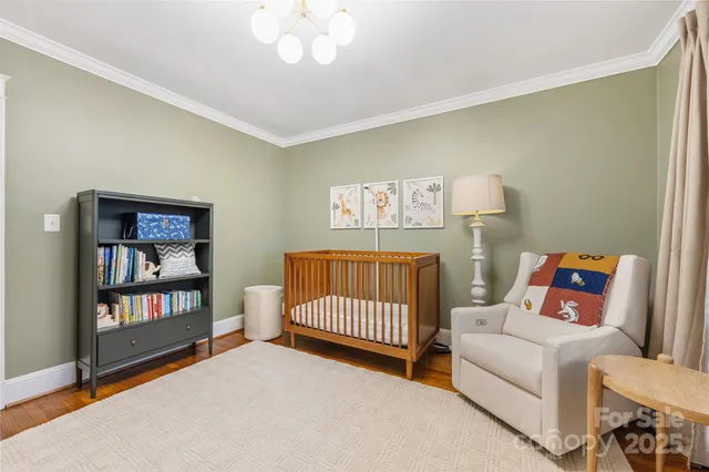 a bed room with a bed and a window