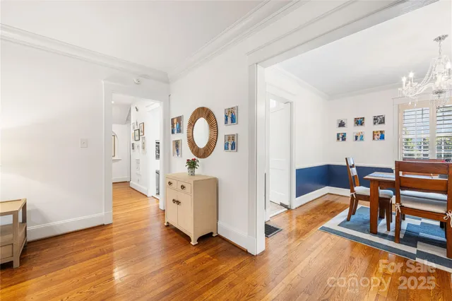 a view of a livingroom with furniture and wooden floor