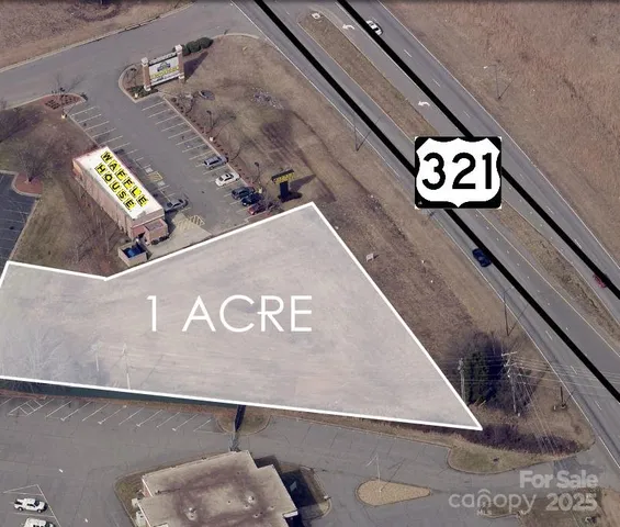 a view of swimming pool with outdoor seating and yard