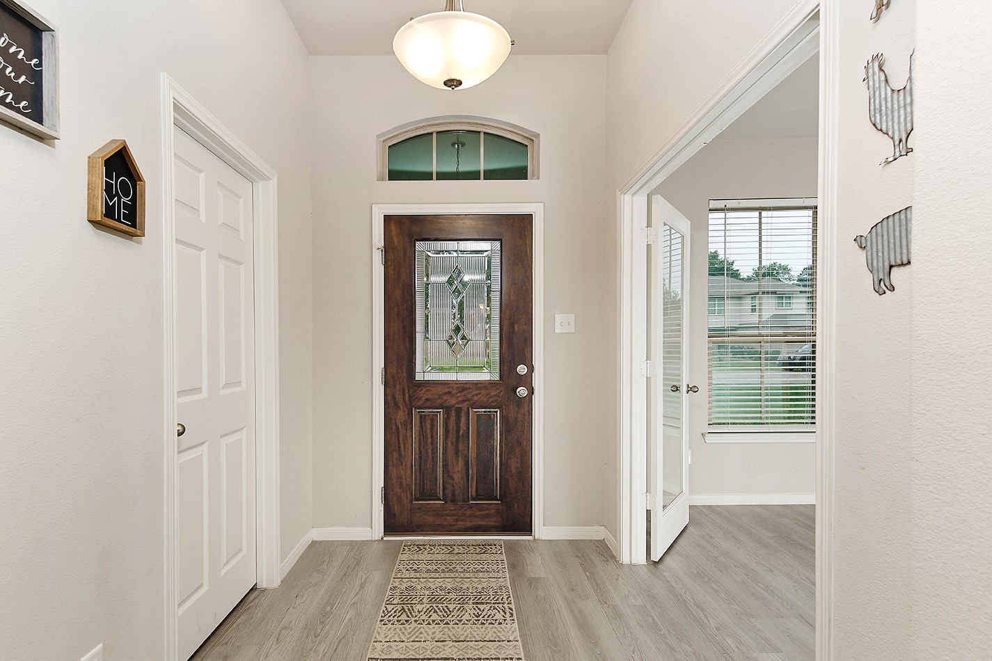 26324 Cooperstown Way Splendora, TX 77372 - Photo 4 of 23 a view of entryway with wooden floor