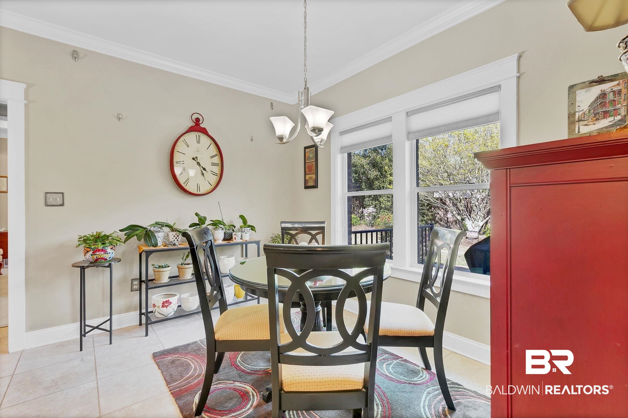 20105 Bunker Loop Fairhope, AL 36532 - Photo 24 of 65 Dining room featuring crown molding, light tile patterned flooring, and baseboards