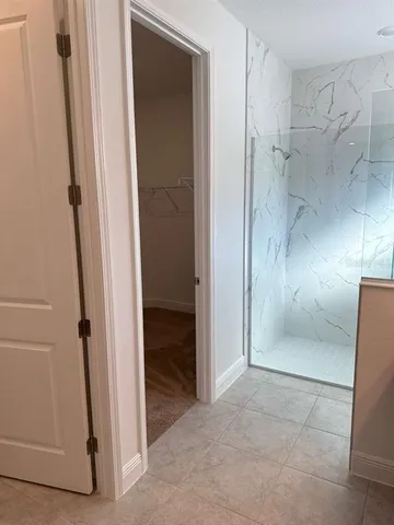 a bathroom with a sink a vanity and a mirror