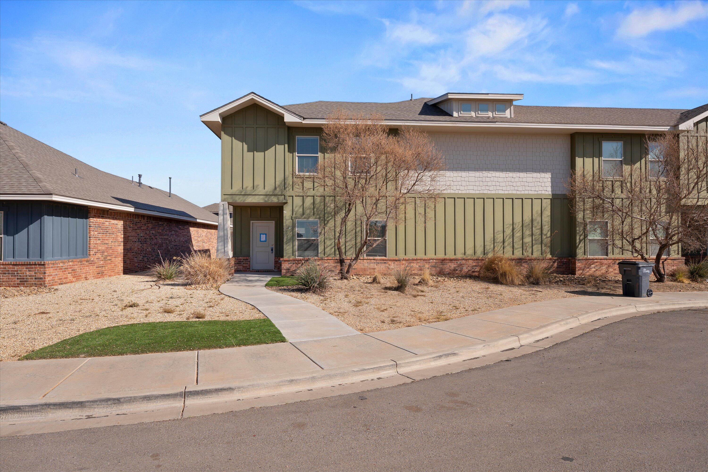 a front view of a house with a patio