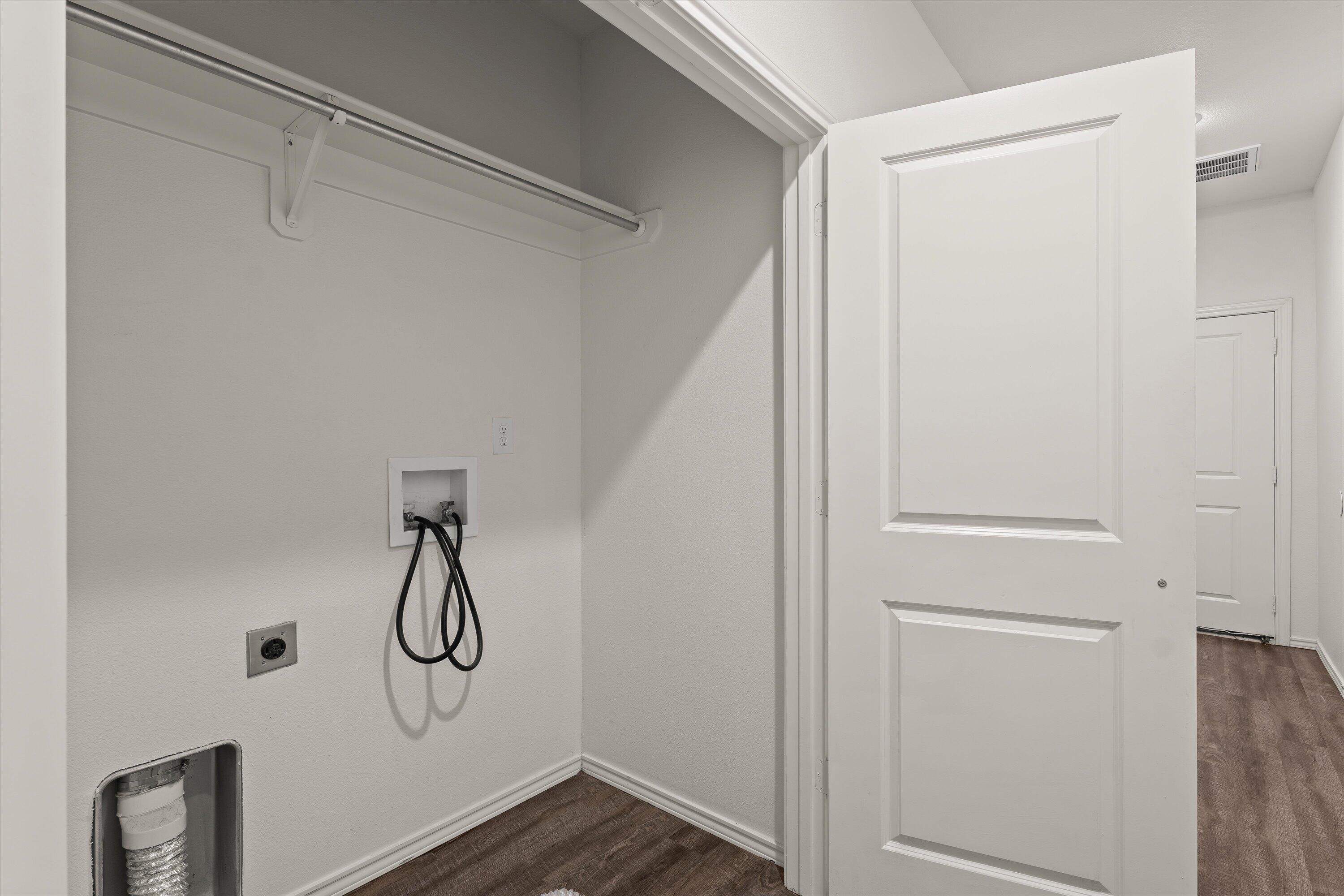 6908 21st Street Lubbock, TX 79407 - Photo 13 of 28 a view of small space with racks on the wall