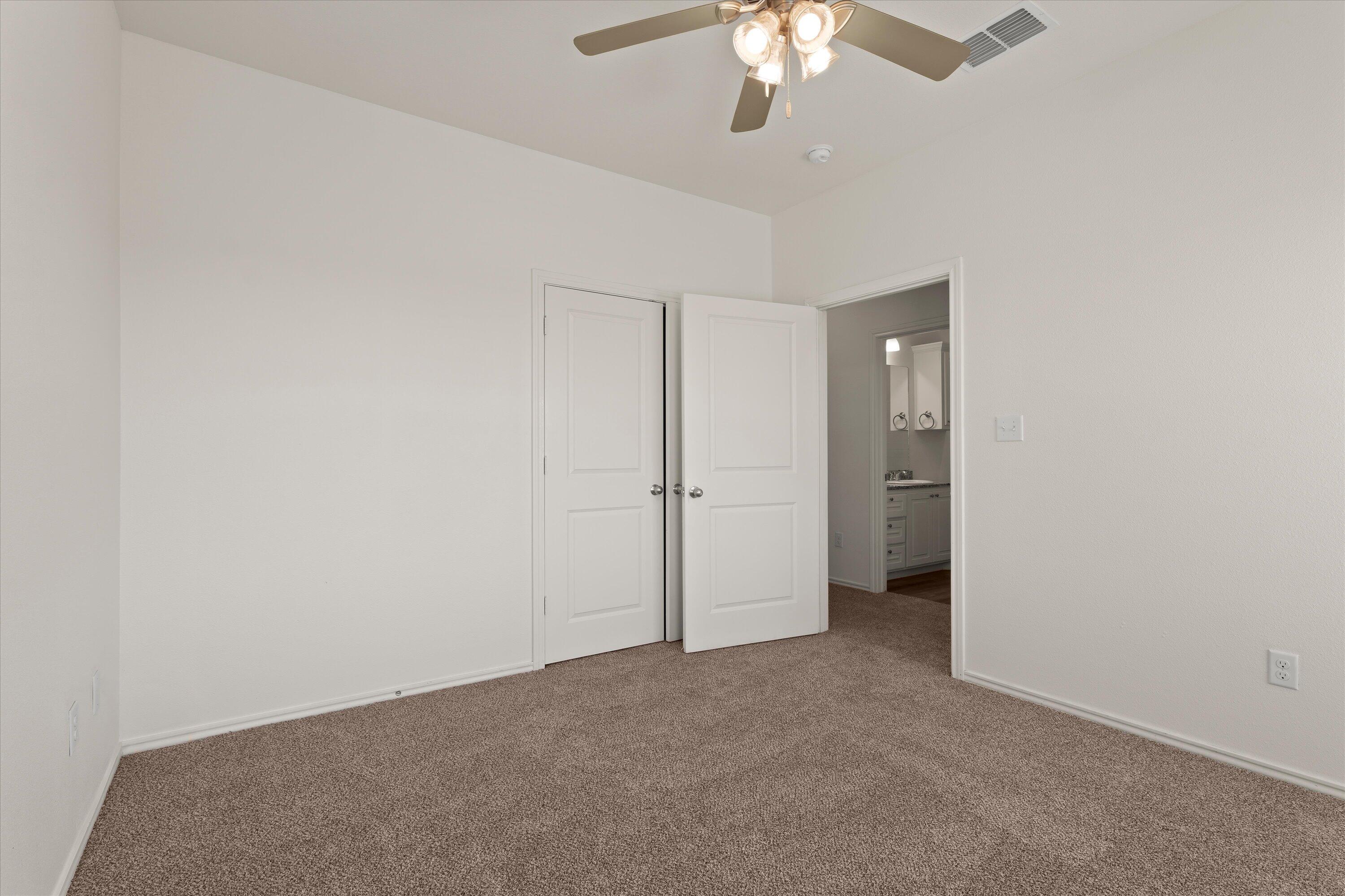 6908 21st Street Lubbock, TX 79407 - Photo 21 of 28 an empty room with a bathroom