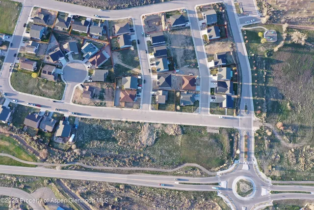 a picture of a door and two chairs