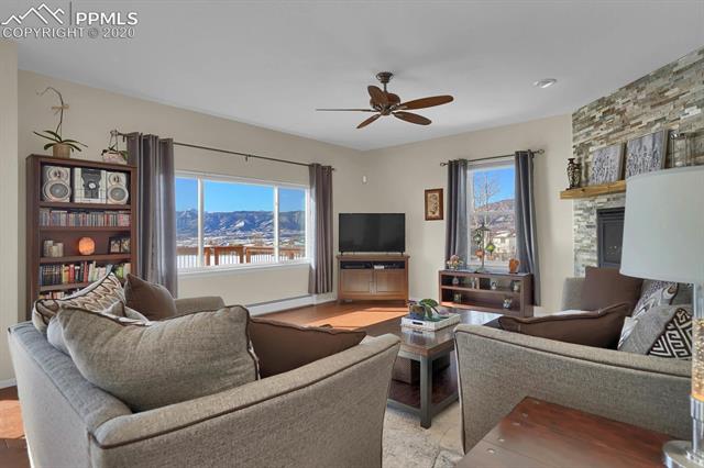 965 Bowstring Road Monument, CO 80132 - Photo 9 of 34 Imagine sitting here enjoying the views and the fireplace.