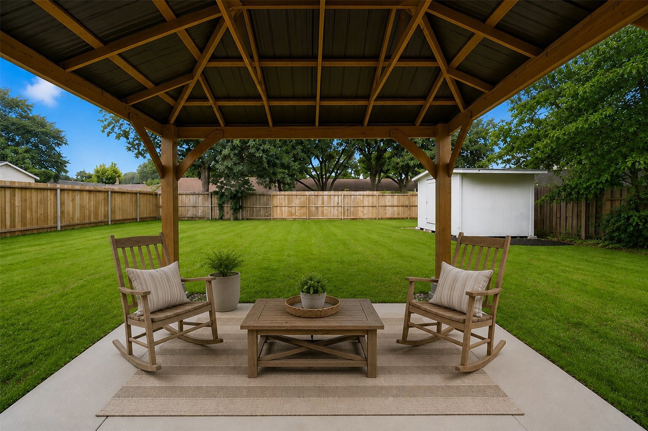 9418 Kilrenny Drive Spring, TX 77379 - Photo 7 of 47 a view of a backyard with sitting area furniture and garden
