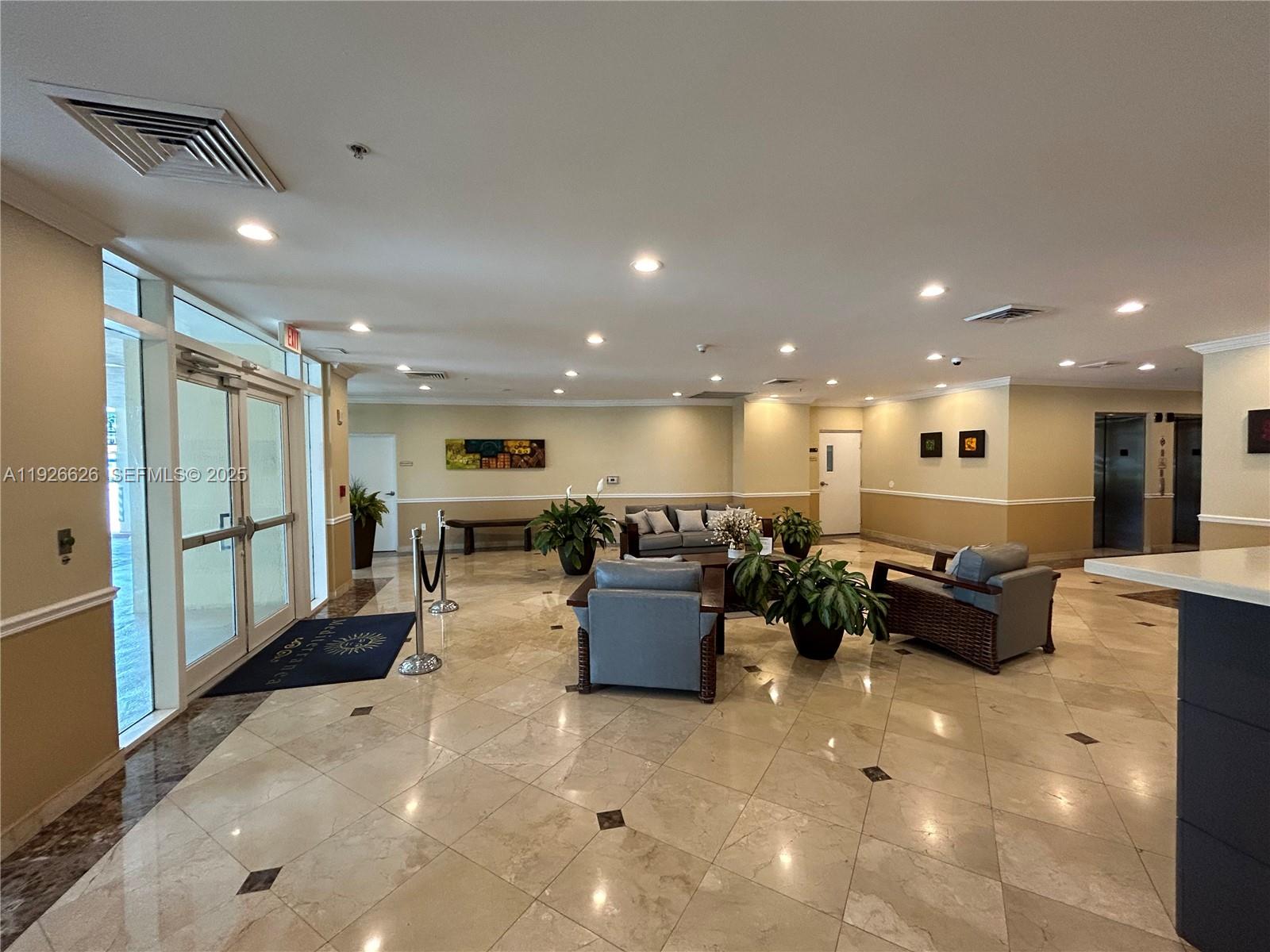 117 Northwest 42nd Avenue, Unit 1516 Miami, FL 33126 - Photo 11 of 76 a living room with furniture and a table