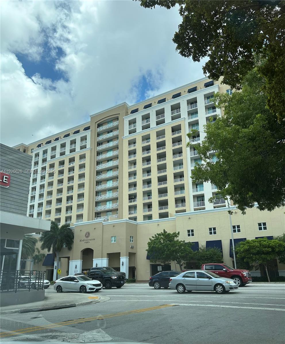 117 Northwest 42nd Avenue, Unit 1516 Miami, FL 33126 - Photo 2 of 76 front view of a building with a street