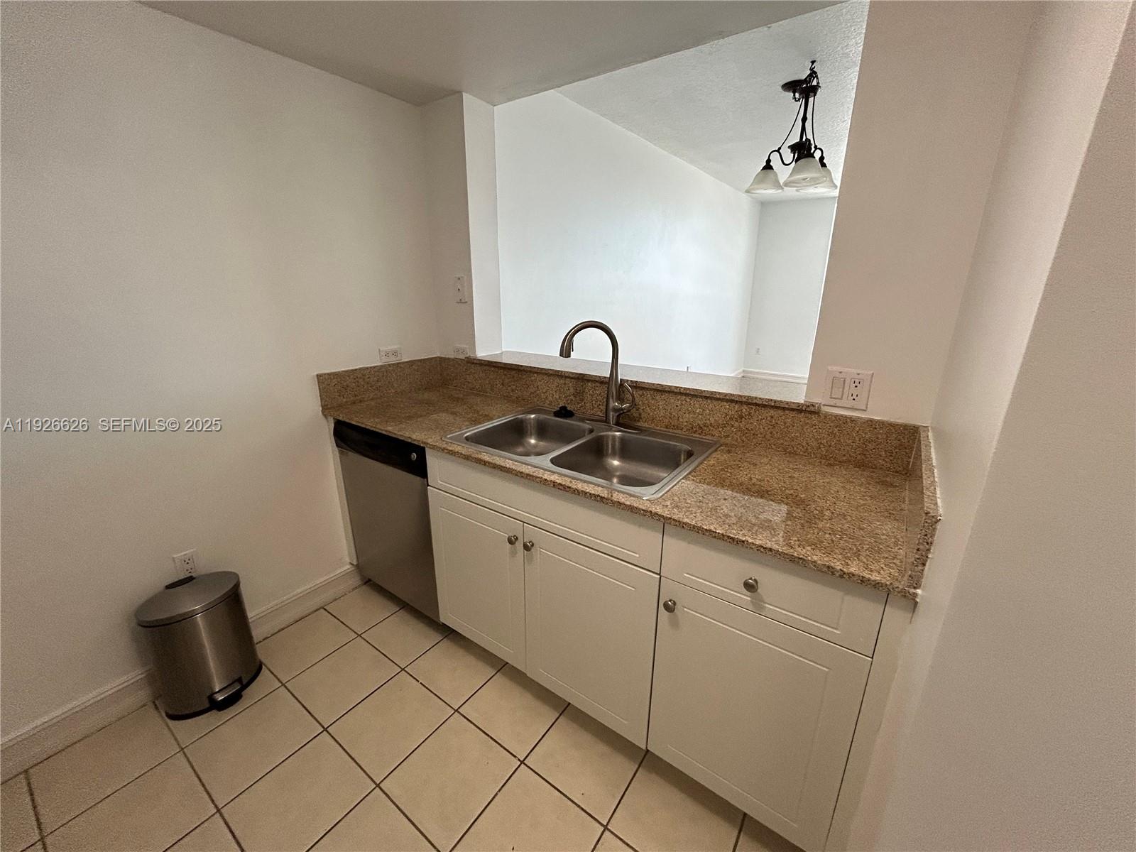 117 Northwest 42nd Avenue, Unit 1516 Miami, FL 33126 - Photo 28 of 76 a close view of sink and tap