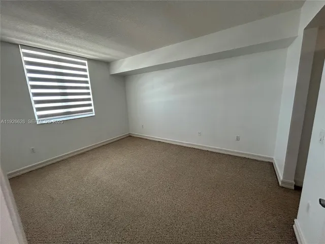 a view of balcony with furniture