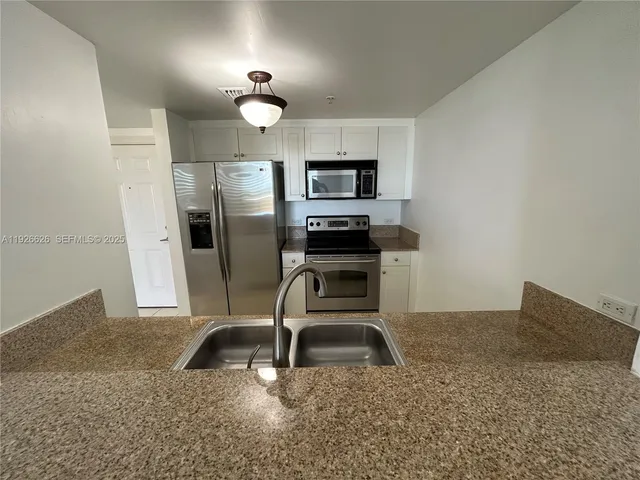 a view of small space with racks on the wall