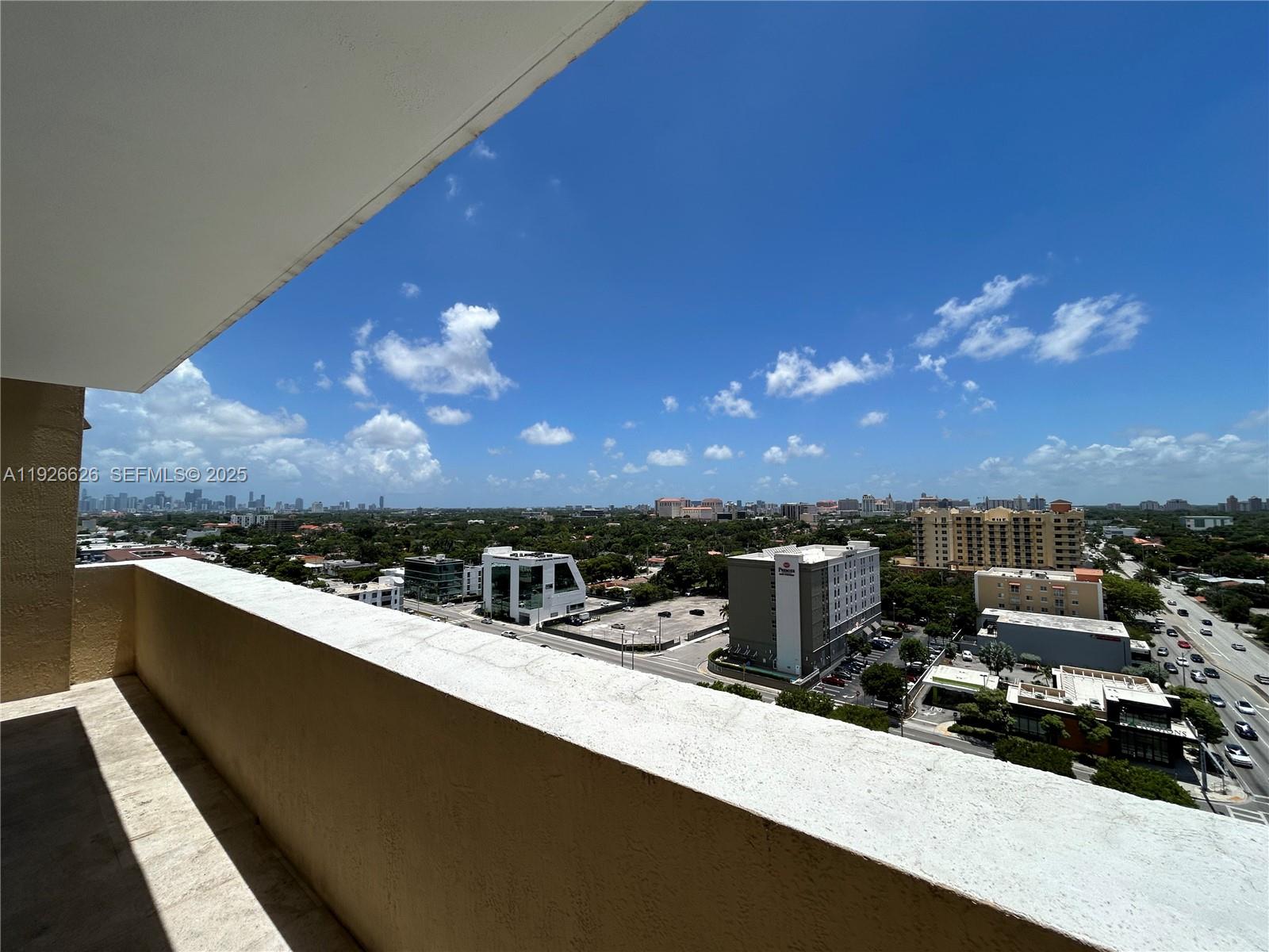 117 Northwest 42nd Avenue, Unit 1516 Miami, FL 33126 - Photo 48 of 76 a view of a swimming pool and sitting area