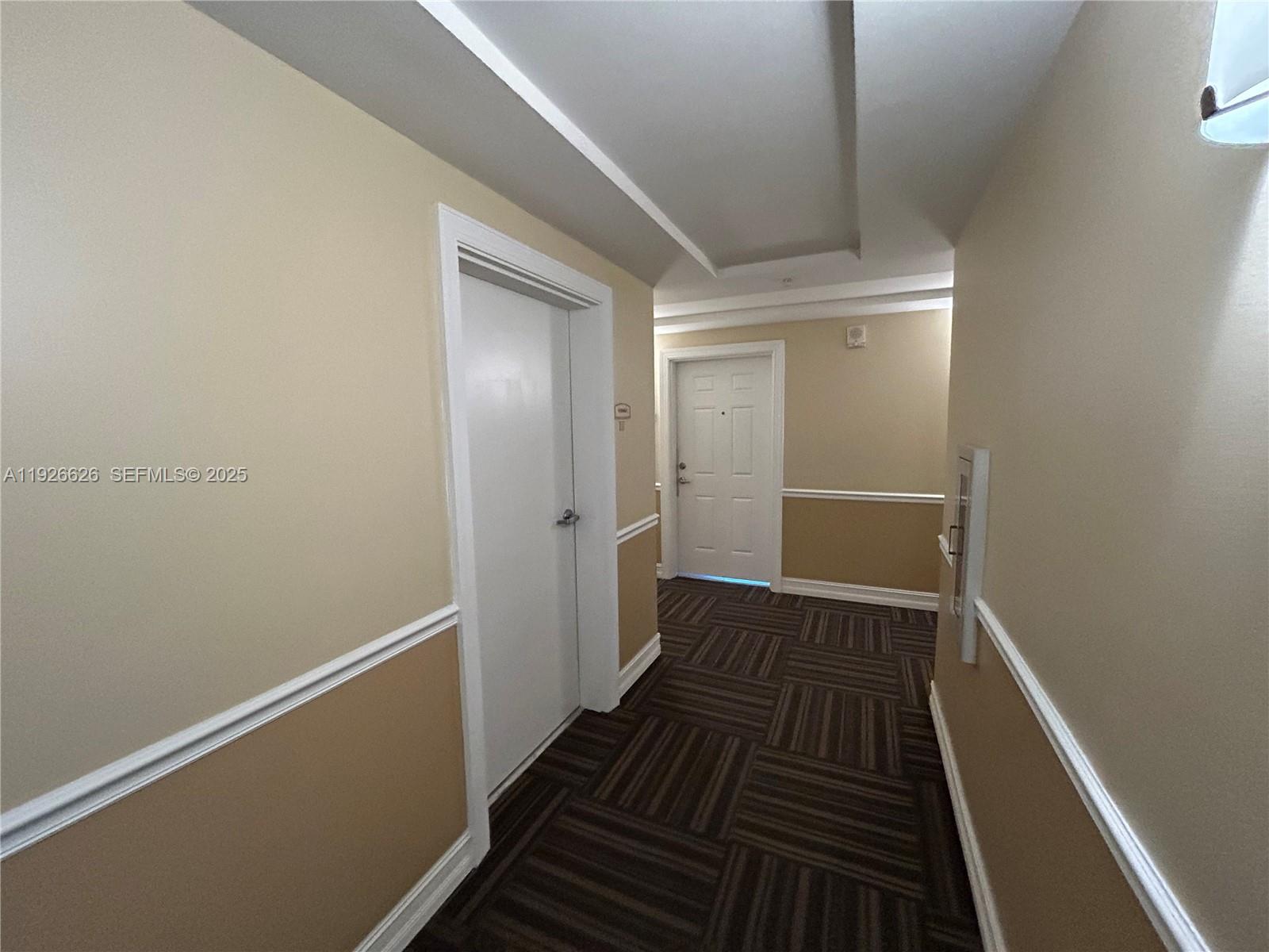 117 Northwest 42nd Avenue, Unit 1516 Miami, FL 33126 - Photo 64 of 76 a view of a room with wooden floor