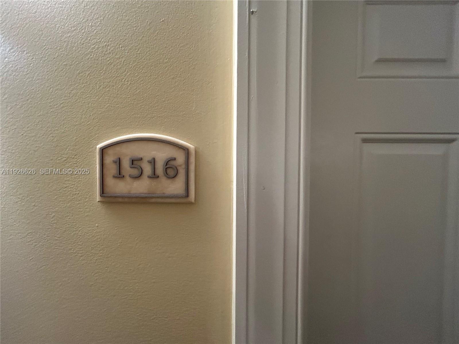 117 Northwest 42nd Avenue, Unit 1516 Miami, FL 33126 - Photo 65 of 76 a painting on a wall next to a white cabinet