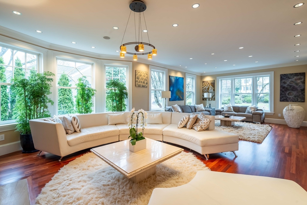 16 Meriam Street Lexington, MA 02420 - Photo 14 of 42 a living room with furniture and a large window
