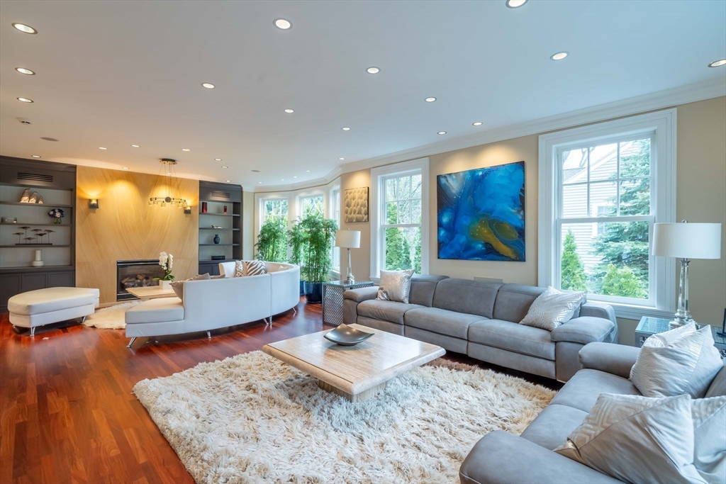 16 Meriam Street Lexington, MA 02420 - Photo 16 of 42 a living room with furniture and a large window