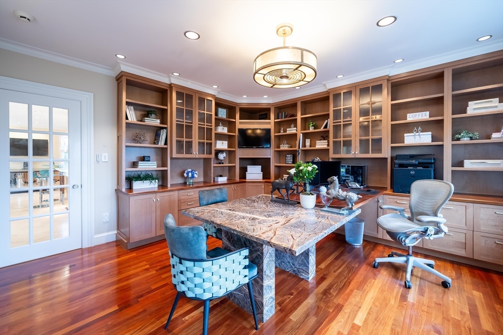 16 Meriam Street Lexington, MA 02420 - Photo 17 of 42 a view of a dining room with furniture a rug and wooden floor