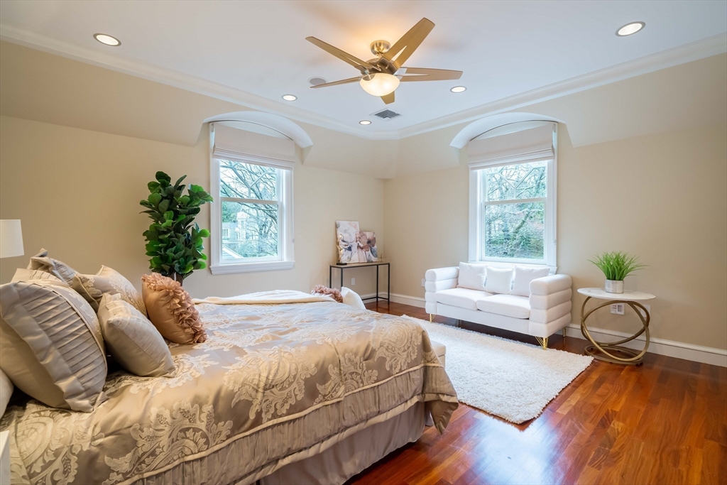 16 Meriam Street Lexington, MA 02420 - Photo 32 of 42 a bedroom with a bed furniture and a large window