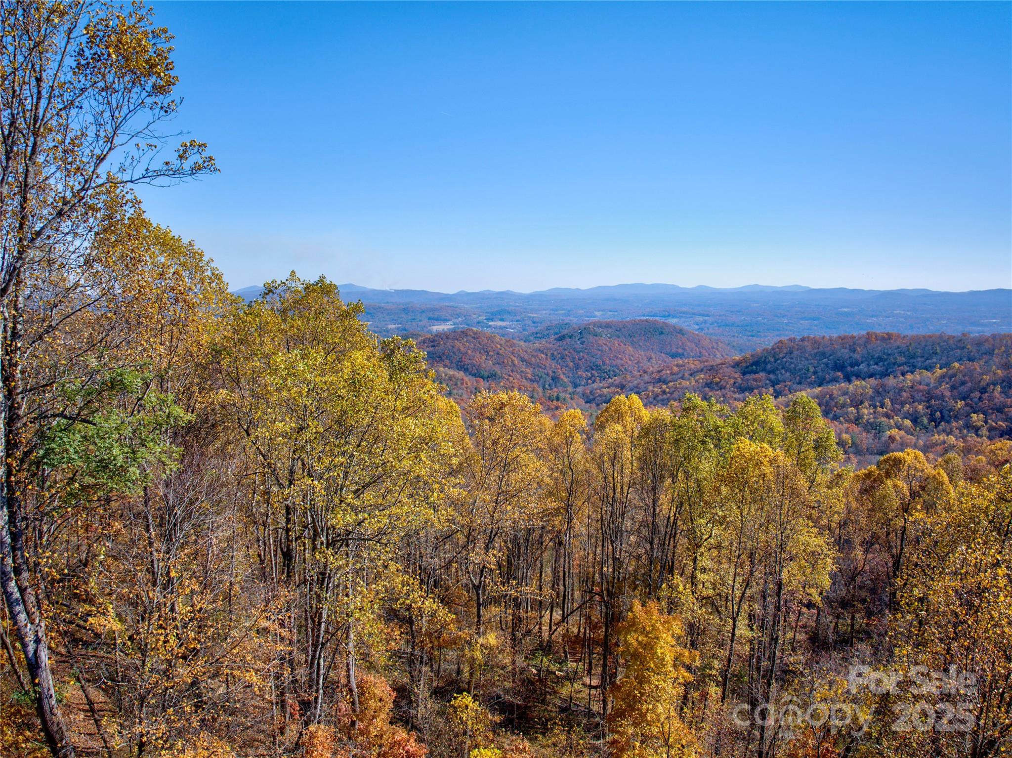 7 Green Laurel Trail, Unit 13 Fletcher, NC 28732 - Photo 27 of 34 a view of a city with mountains in the background