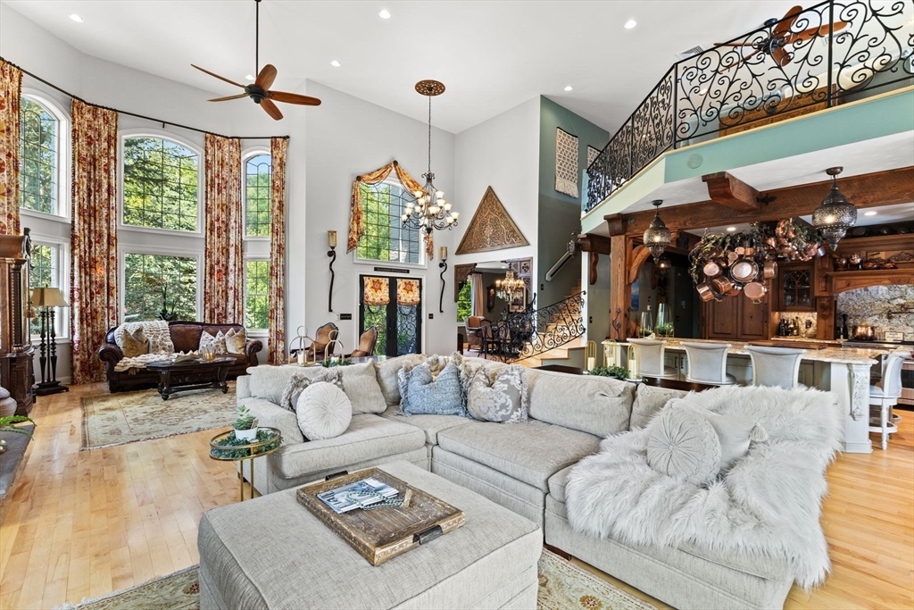 1276 Old Fall River Road Dartmouth, MA 02747 - Photo 11 of 42 a living room with furniture ceiling fan and a large window