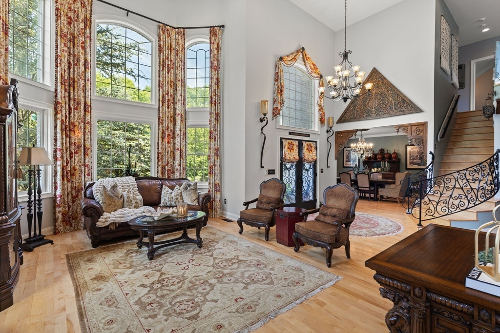 1276 Old Fall River Road Dartmouth, MA 02747 - Photo 14 of 42 a living room with furniture fireplace and a table