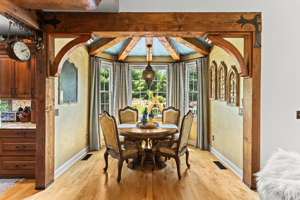 1276 Old Fall River Road Dartmouth, MA 02747 - Photo 18 of 42 a dining room with furniture and wooden floor