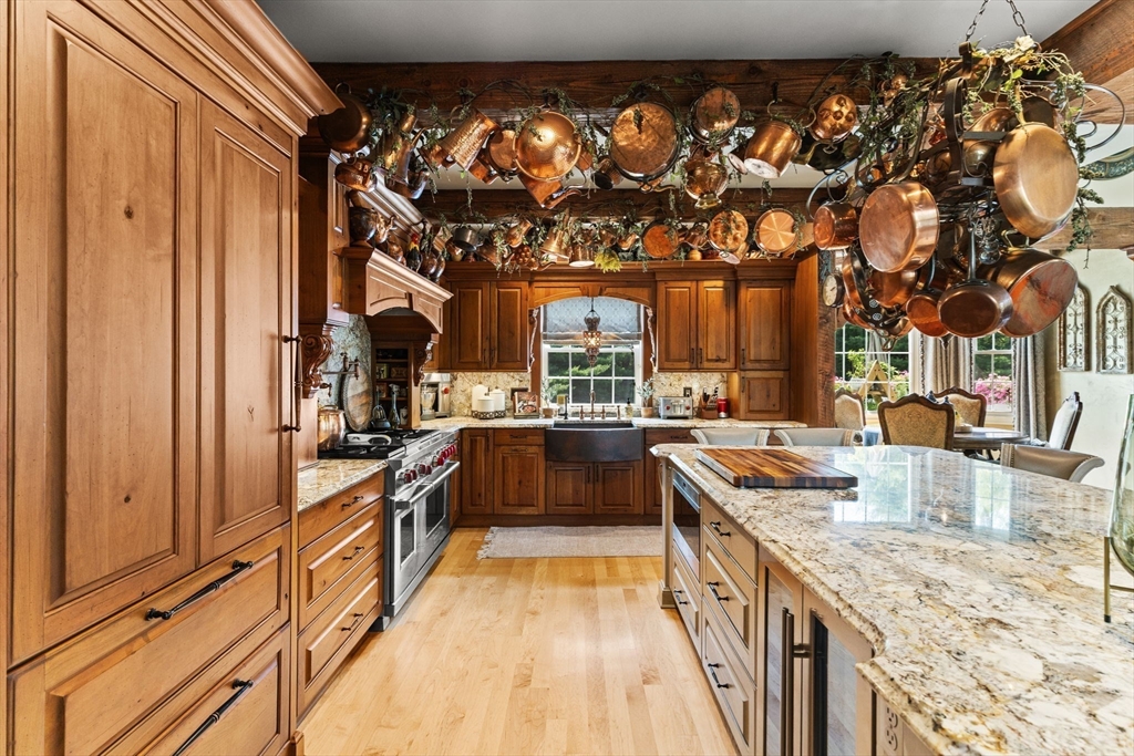 1276 Old Fall River Road Dartmouth, MA 02747 - Photo 20 of 42 a kitchen with granite countertop lots of counter top space and stainless steel appliances