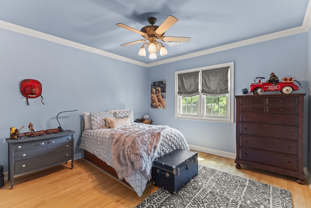 1276 Old Fall River Road Dartmouth, MA 02747 - Photo 30 of 42 a bedroom with a bed and a dresser in it